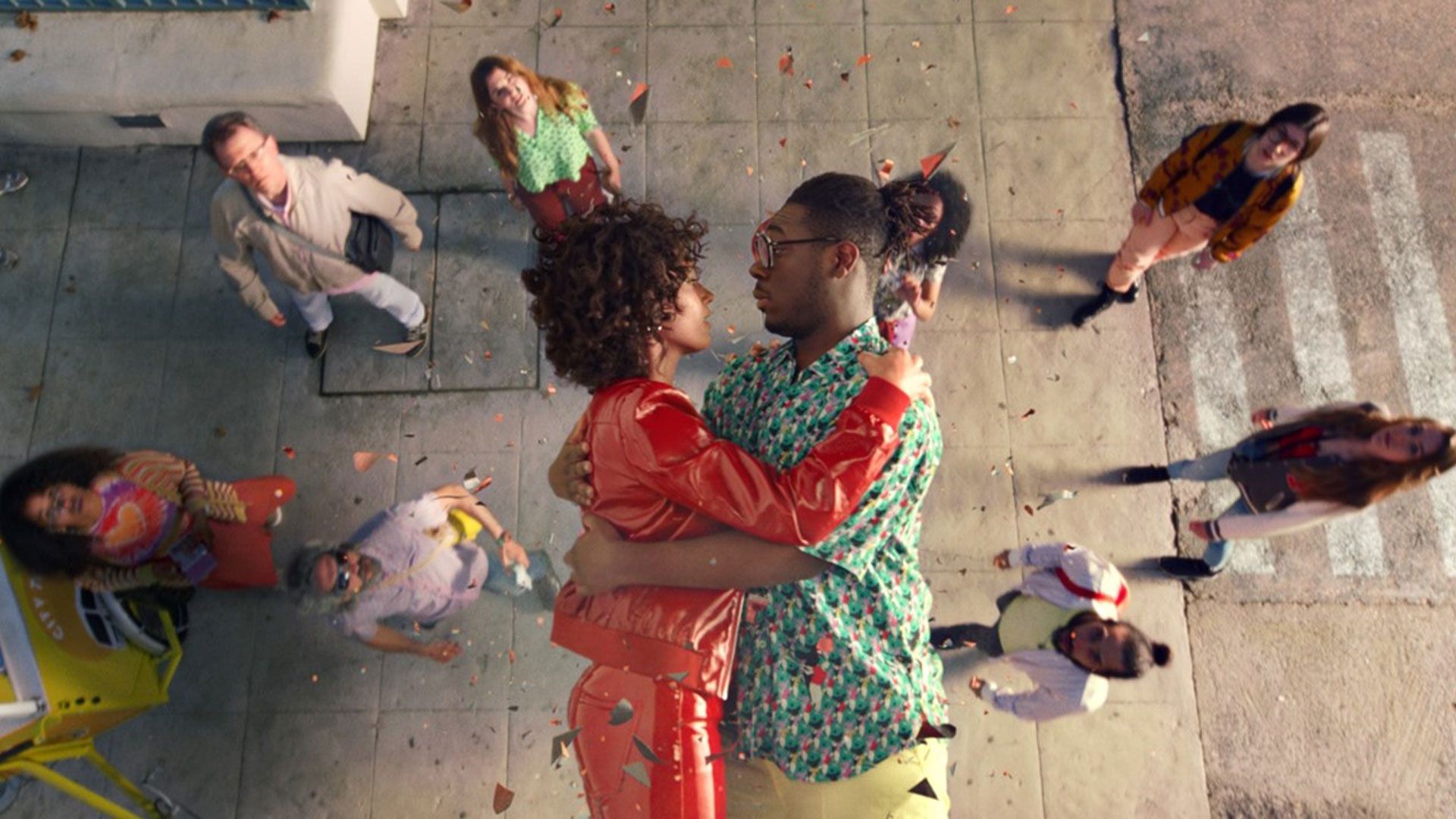 A man and woman embrace in an Axe commercial.