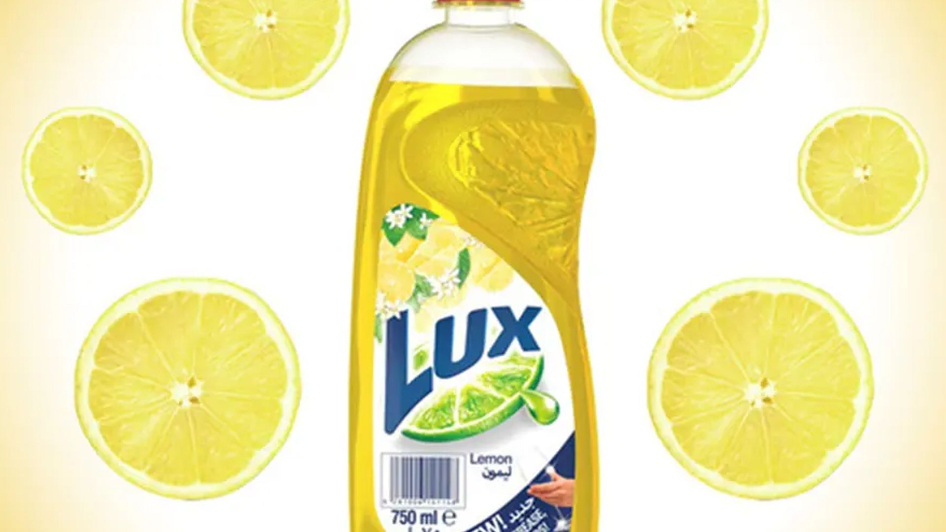 Bottle of Lux hand dishwashing liquid. The formulation is 99% biodegradable and uses 100% plant-derived ingredients.