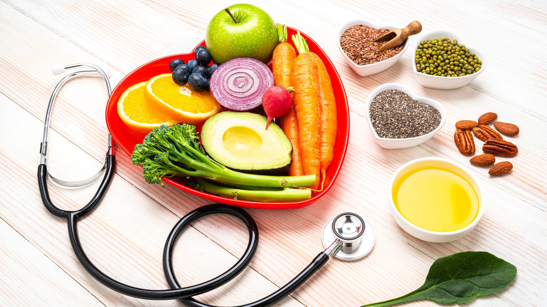 Various food items next to a stethoscope.