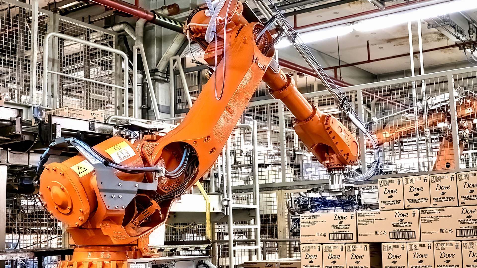 Automated picking machine placing packs of Dove Beauty Bars onto a pallet at Unilever’s Mannheim factory in Germany